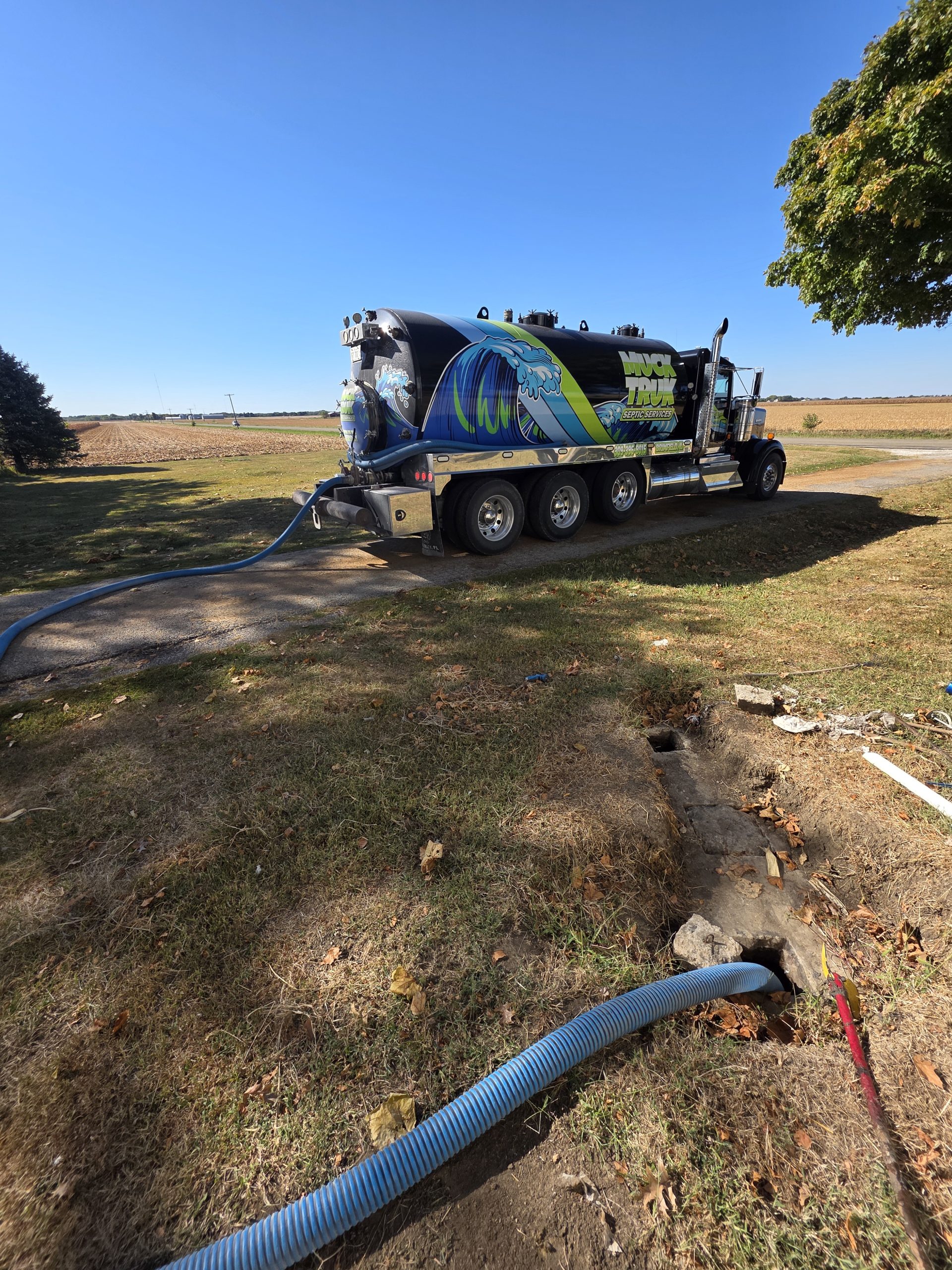 Septic services truck with hose
